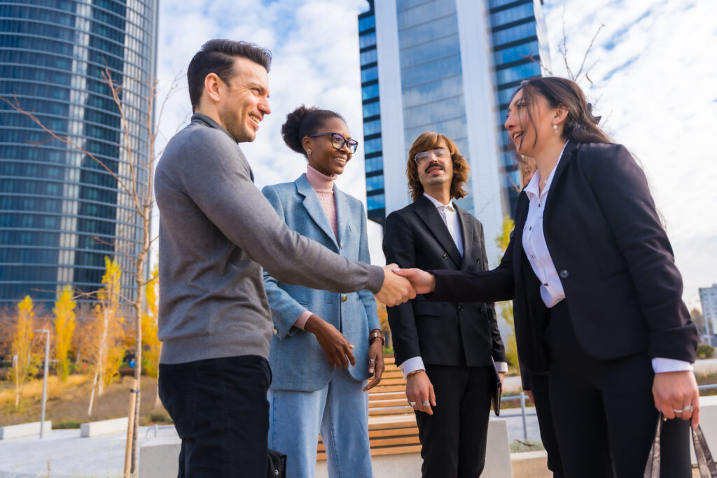 Sales reps preparing for outreach campaigns